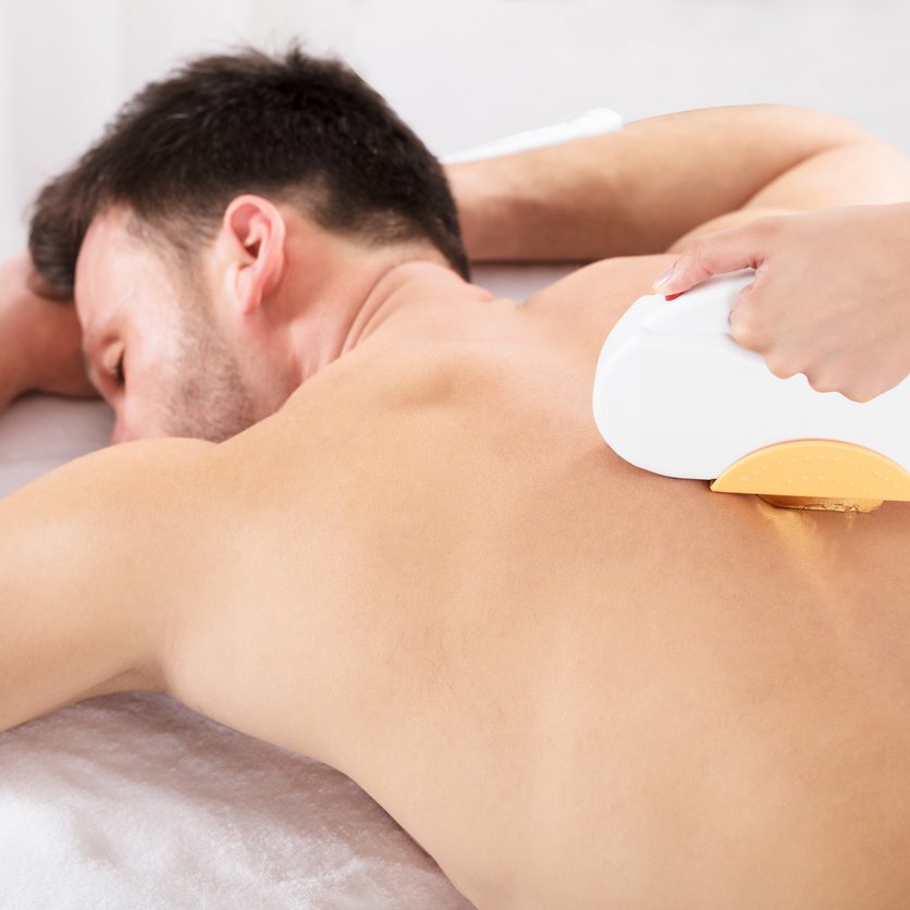 Hair Removal Cosmetology Procedure From A Therapist At Cosmetic Beauty Spa Clinic
